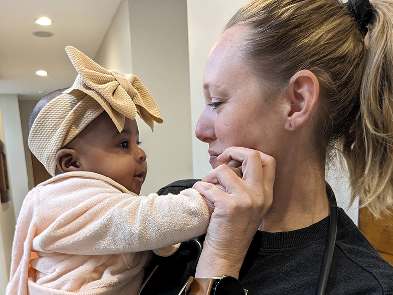 Lake Charles Primary Care Pediatric Care, Provider with a baby.