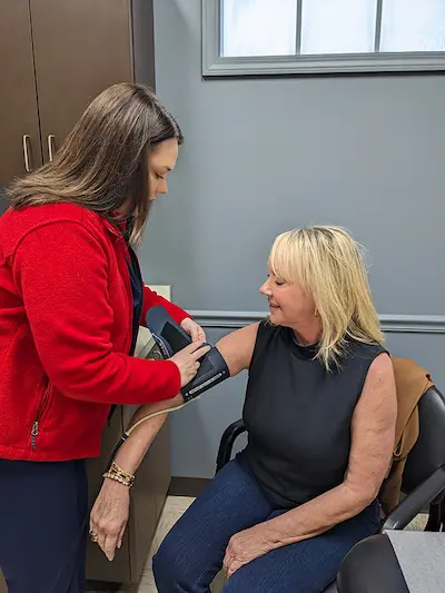 patient taking their blood pressure